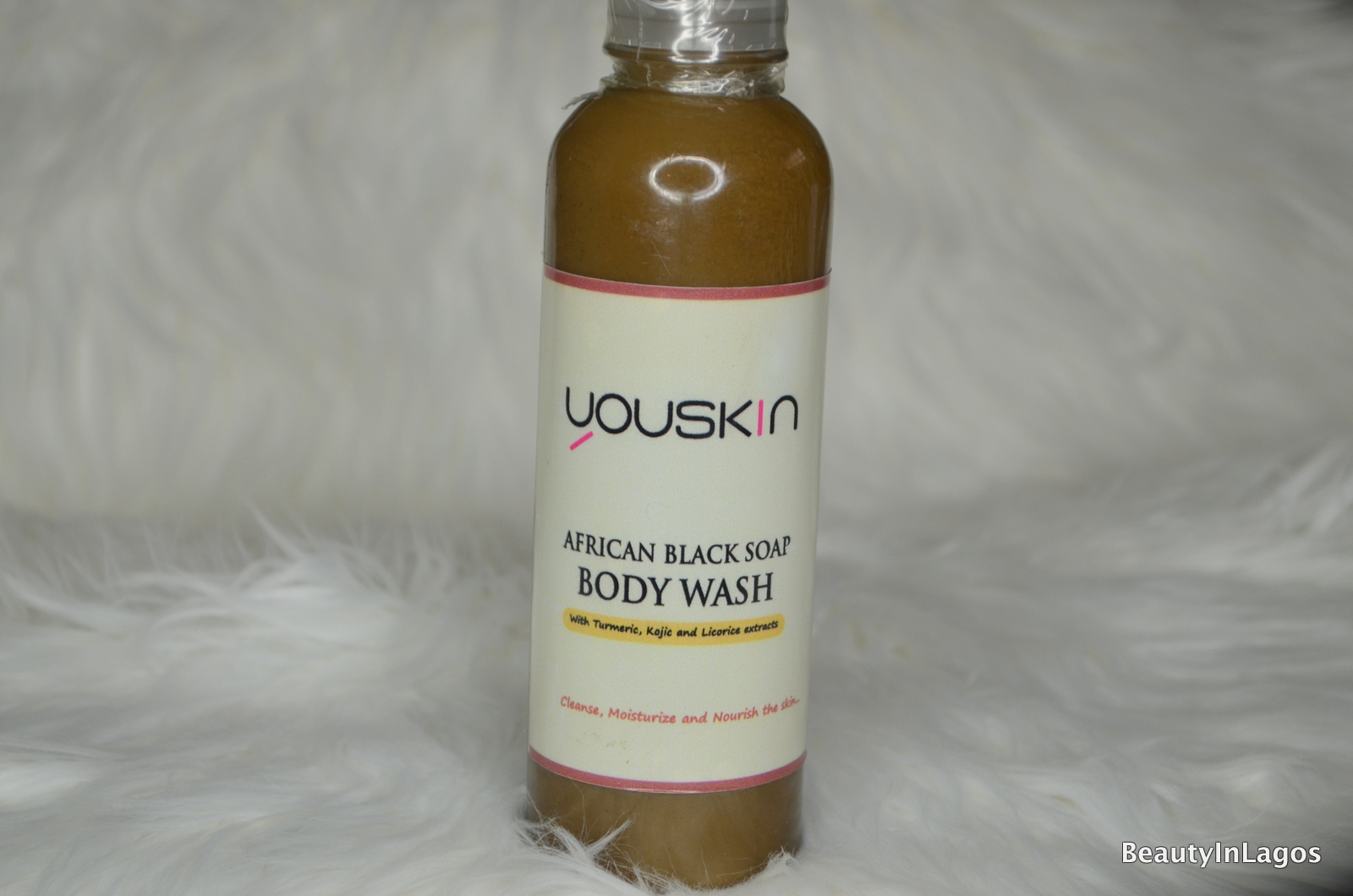 "youskin" liquid black soap is an all-natural creamy soap